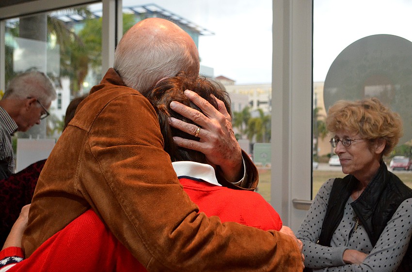 Friends and supporters of Chapman consoled her after she missed out on a spot in the May runoff.