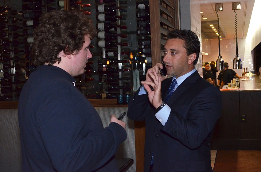 Hagen Brody gets the final results on the phone.