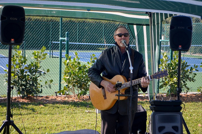 Dan Crawford, a vocalist and entertainer, performed throughout the event.