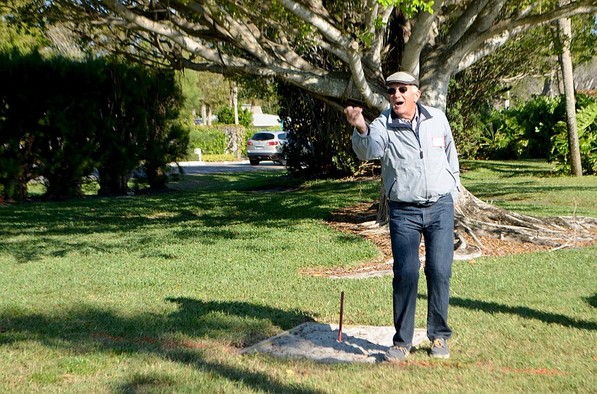 Ron Mechlin plays a round of horseshoes during the Whitney Beach barbecue on March 15.