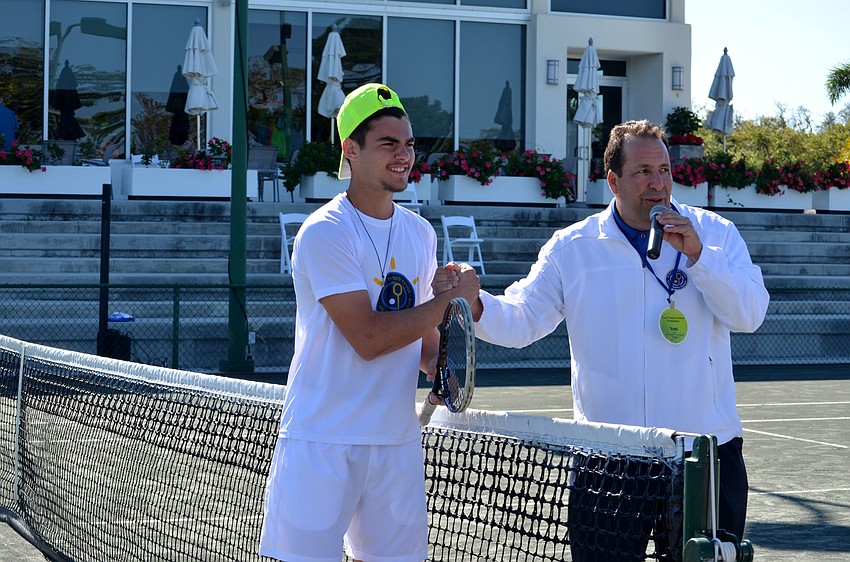 Yoni Yair introduces Shadi, 17, to the crowd.