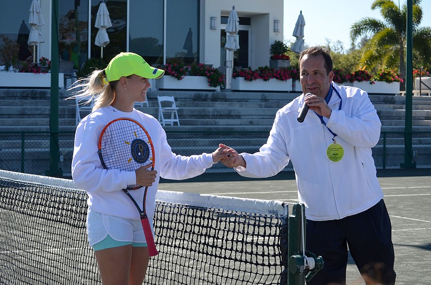 Yoni Yair introduces Alona, 20, to the crowd. Alona has been going to an Israel Tennis Center for 10 years and was the team captain on this trip.