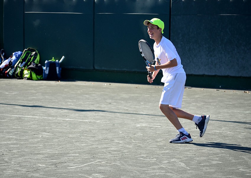 Gabi, 15, is all smiles during the exhibition at the Longboat Key Club Tennis Gardens on March 15.