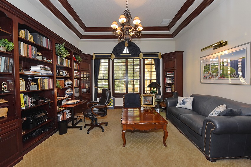 The gentleman'    s study contains enough books for everyone.