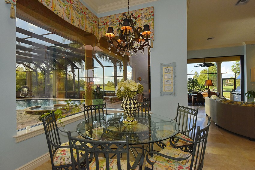 How about a card game while watching others enjoy the pool?