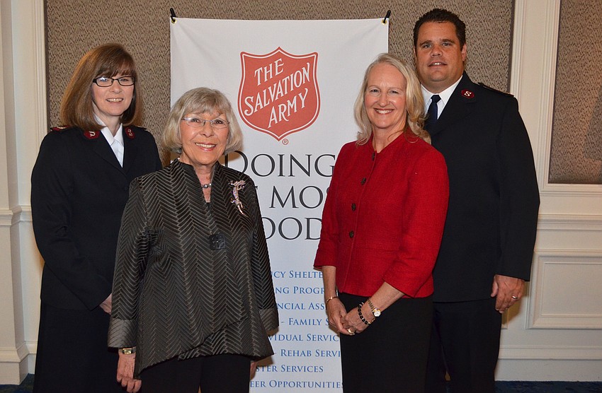 Major Sue Frizzell, Honoree Gerri Aaron, Chairwoman Kim Cornetet and Major Ethan Frizzell