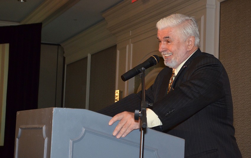Emcee Cliff Roles welcomes guests to Glitz at the Ritz on March 16 at The Ritz-Carlton, Sarasota.