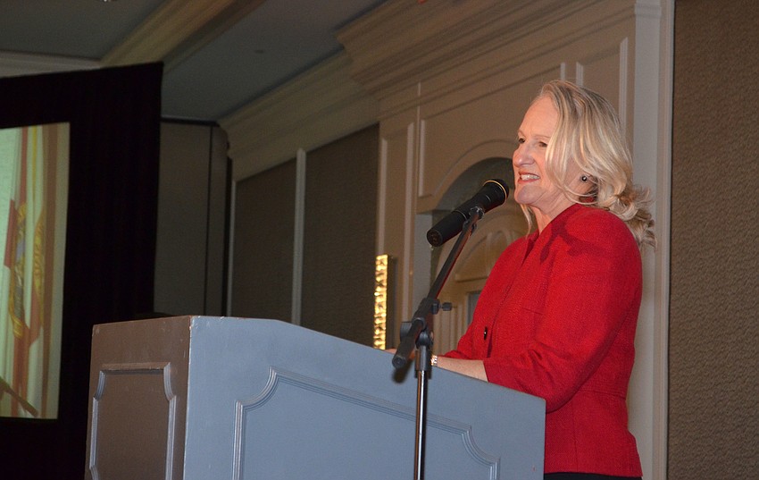 Chairwoman Kim Cornetet welcomes guests to Glitz at the Ritz on March 16 at The Ritz-Carlton, Sarasota.