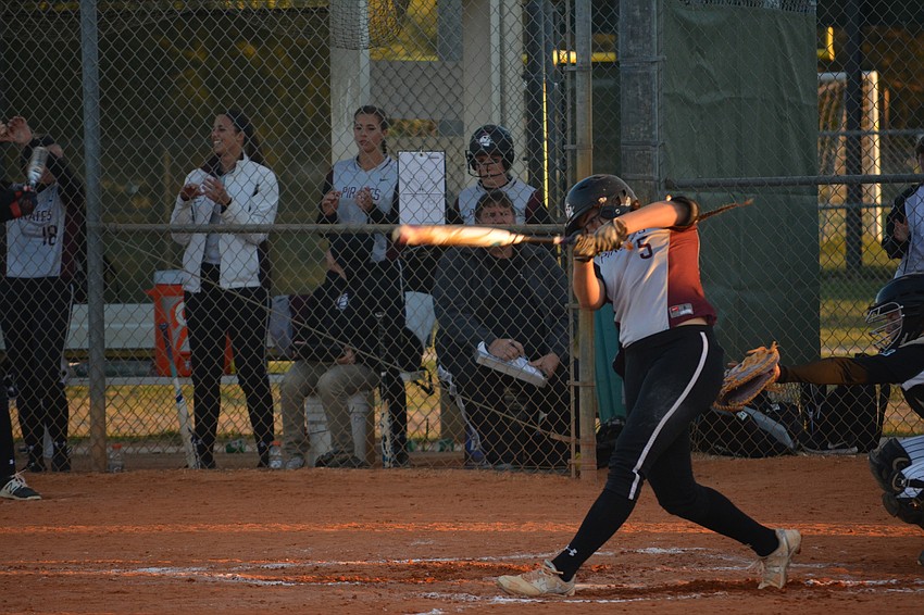 Braden River'  s Sarah Crawford makes solid contact.