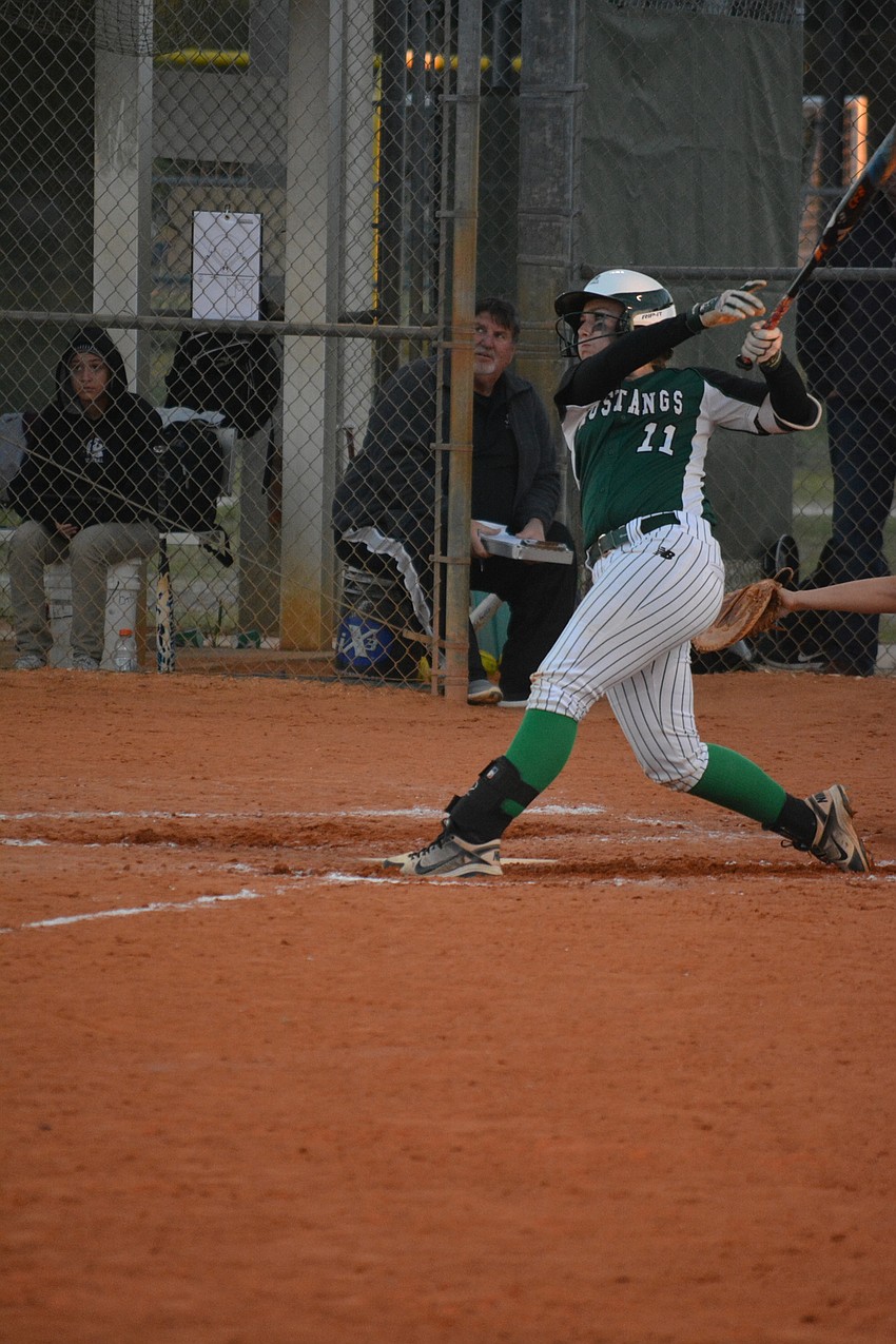 Lakewood Ranch'  s Morgan Cummins crushes a ball out of the park.