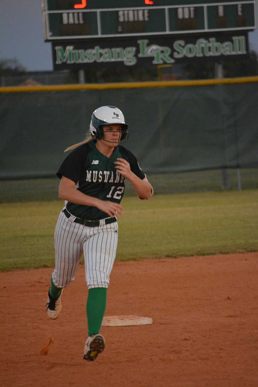 Lakewood Ranch'  s Maddie Koczersut celebrates a home run.