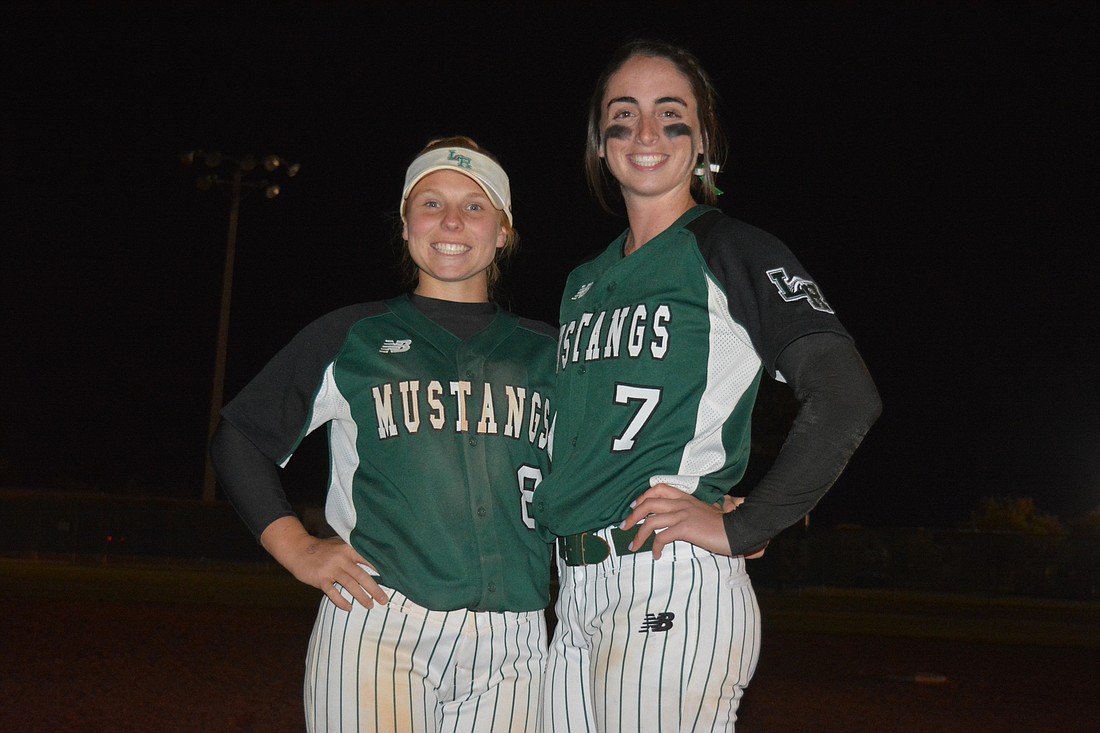 Kailey Christian and Logan Newton after the Mustangs&#39;      10-4 win over Braden River.