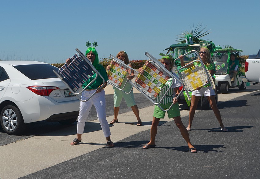 “Paddy-O Furniture Drill Team” performed a short routine during the parade.