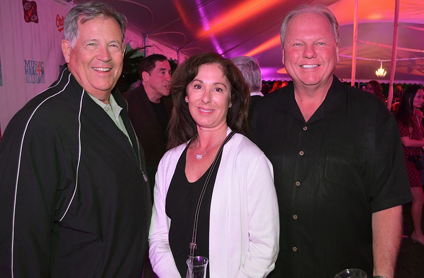 Charlie Dunn with Becky and Jeff Taylor