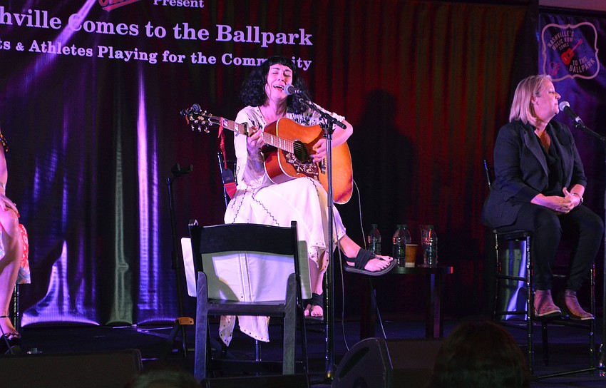 Laura Veltz sings “Drunk Last Night,” which she wrote for Eli Young Band, at Nashville' s Music Row Comes to the Ballpark on March 17 at Ed Smith Stadium.