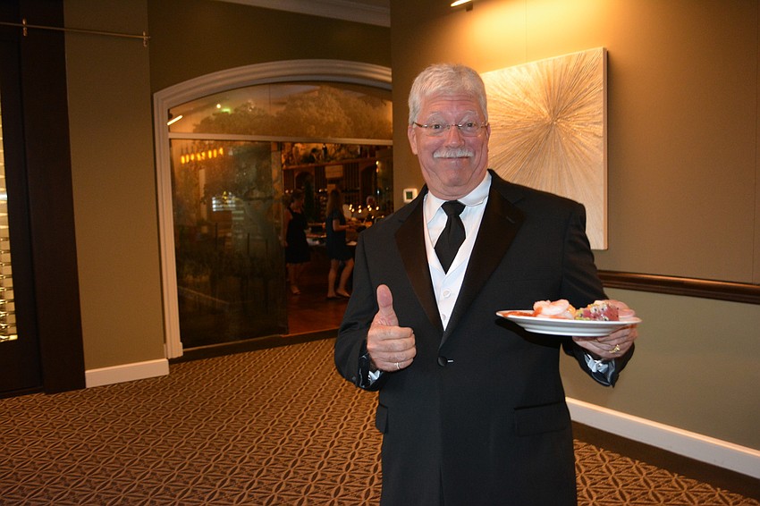 Lakewood Ranch'  s Don Baugh gives a thumbs up to the great selection of food at the gala.