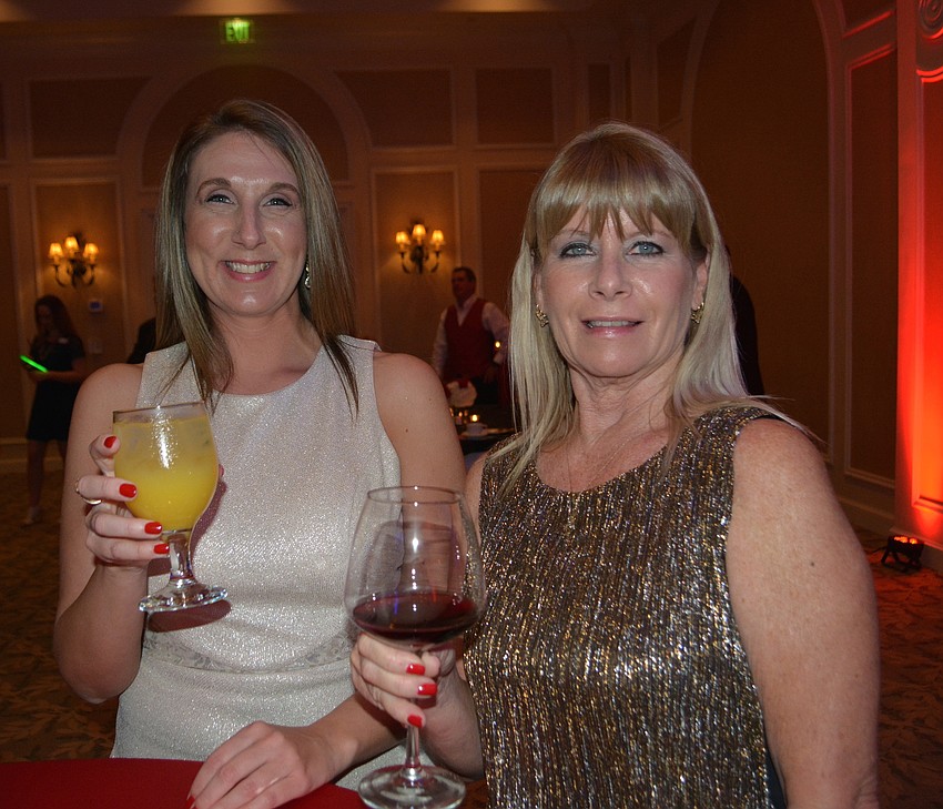 Lakewood Ranch'  s Heather Black and Starla Armstrong enjoy some adult beverages at the gala.