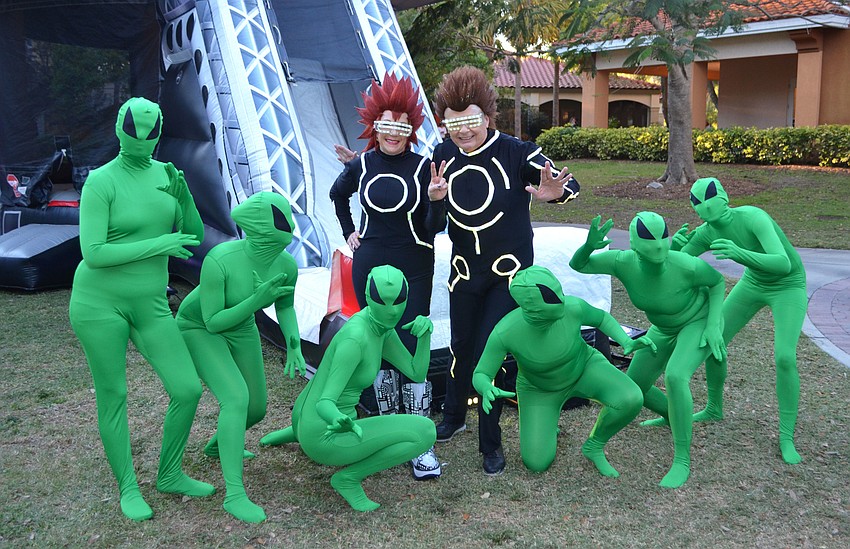 Pat and Larry Thompson make their grand entrance at An Evening at the Avant-Garde on March 18 at Ringling College of Art and Design.