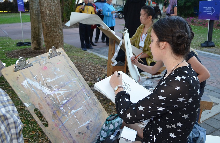Ringling College of Art and Design student Esther Sitver does a live sketch at An Evening at the Avant-Garde on March 18 at Ringling College of Art and Design.