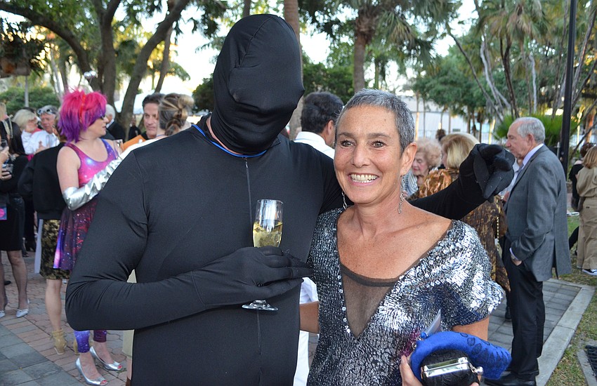Ringling College of Art and Design Board Chairman Dean Eisner makes Nelle Miller laugh at An Evening at the Avant-Garde on March 18 at Ringling College of Art and Design.