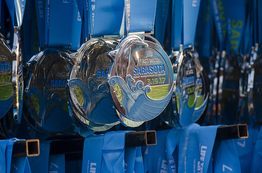 Finishers received a First Watch Sarasota Half Marathon medal.