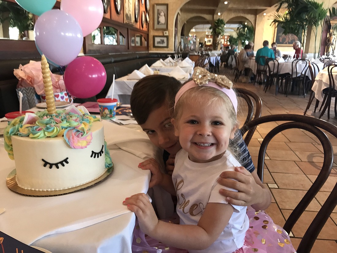 Charlotte Watts celebrates her third birthday with cousin John-Ford on March 19 at Columbia Restaurant. Photo courtesy of Fondren Watts