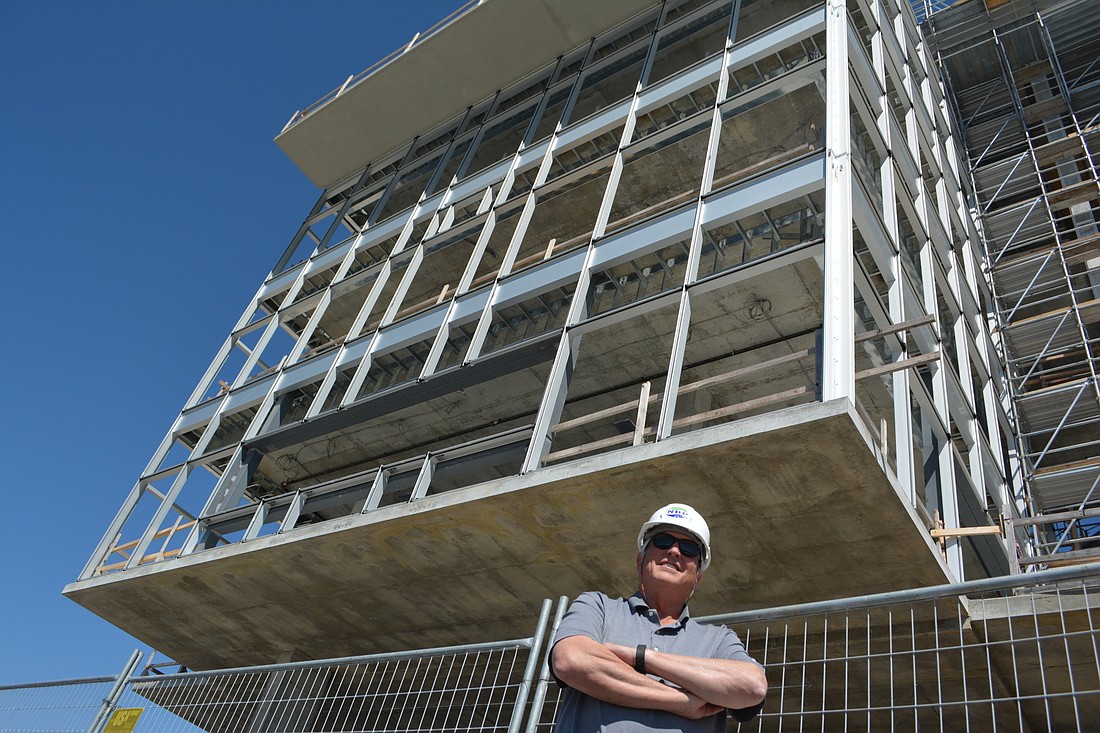 SANCA President Bob Sullivan stands in front of the new finish tower, which only needs windows and cosmetic work to be complete.