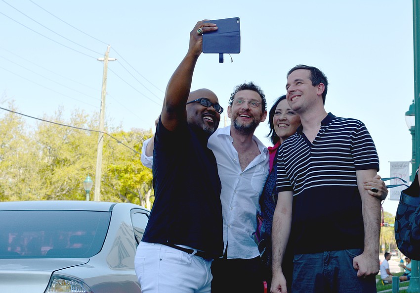 Attendees gather for a selfie.