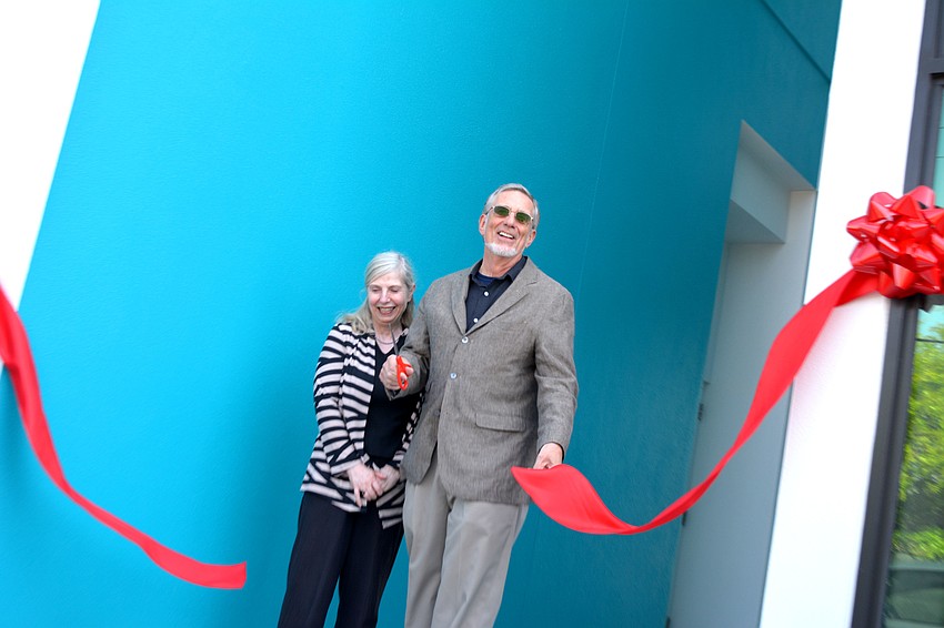 Paul and Sharon Steinwachs cut the ribbon.