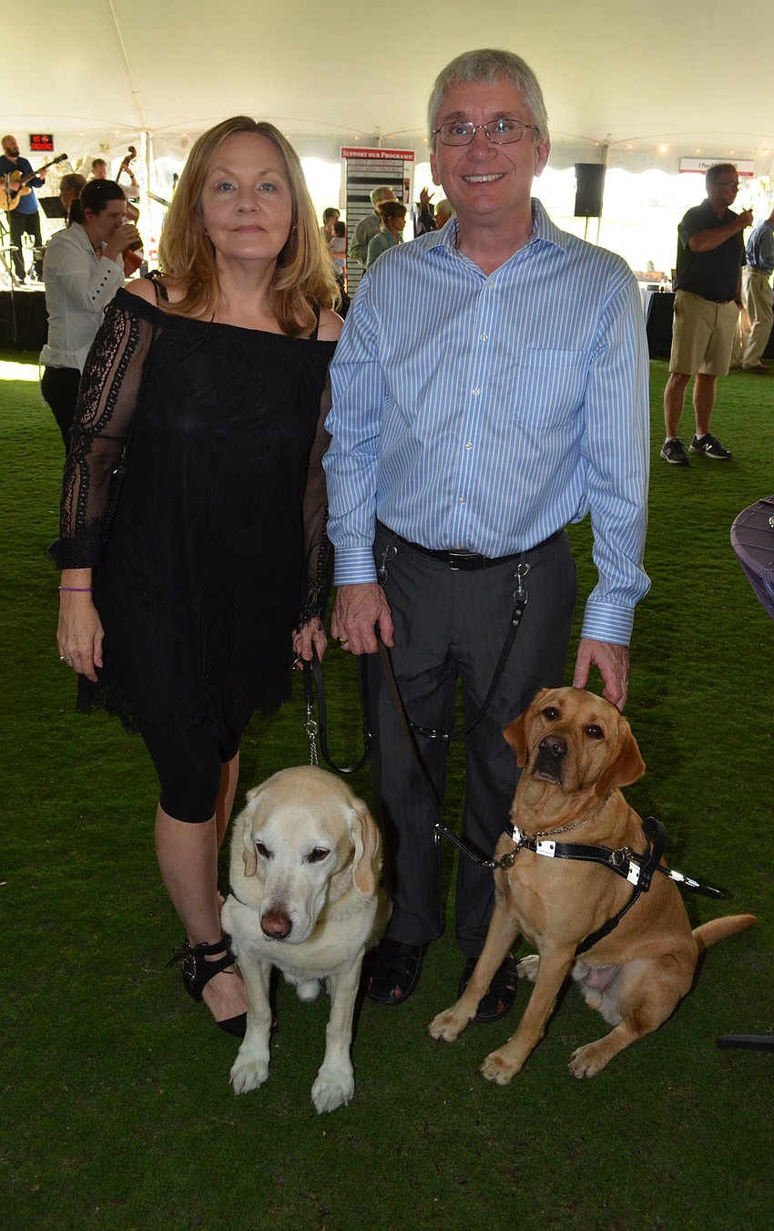 Chris and Lynn McNamee with Max and Kevin, Southeastern Guide Dogs