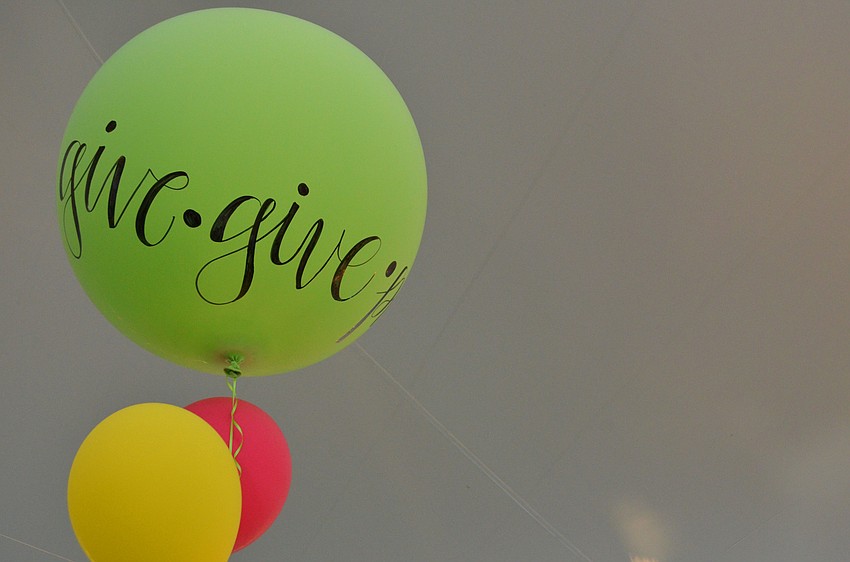 The first table that guests saw upon entering the event on March 21 at the Resort at Longboat Key Club had a display explaining where their donations can go.