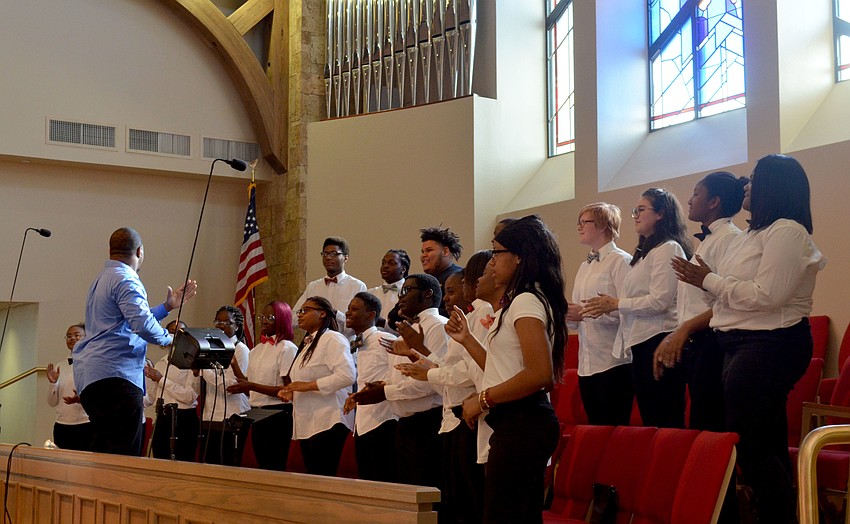 The Booker High School Gospel Choir Club performed various songs for the members of Christ Church on March 22.
