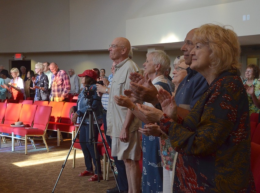 The Booker High School Gospel Choir Club had Christ Church members on their feet and clapping during the performance.