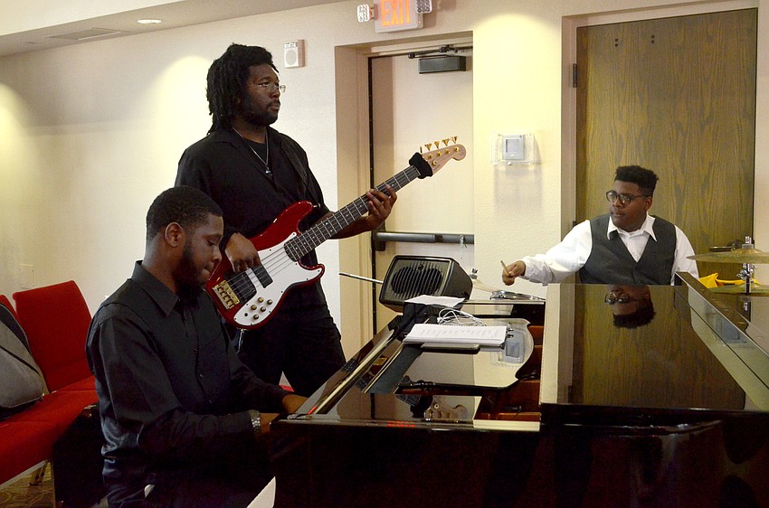 The Booker High School Gospel Choir Club performed various songs for the members of Christ Church on March 22.