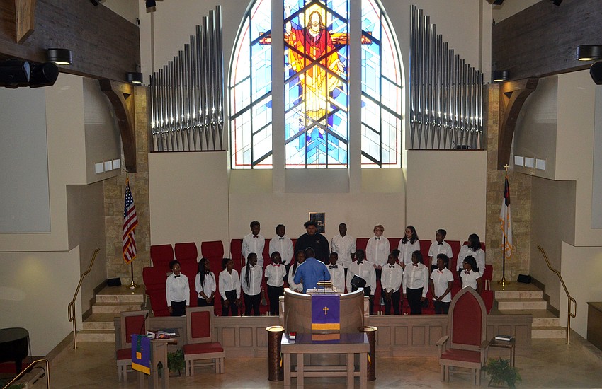 The Booker High School Gospel Choir Club performed various songs for the members of Christ Church on March 22.