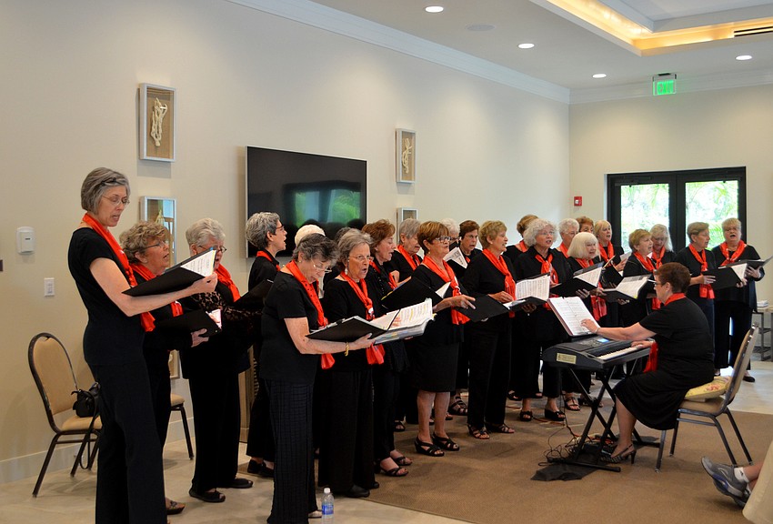 Key of Sea choral group sang at The Players Club on March 23 for friends and residents of the complex.