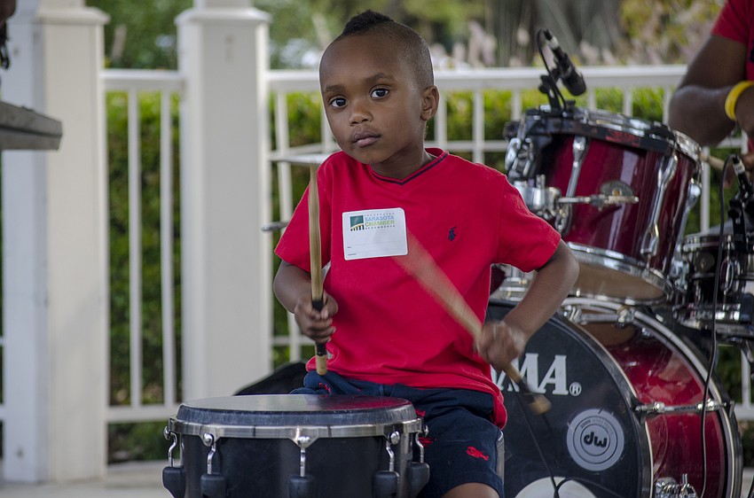 Ky-mani Caies joined his parents, Damie Caies and Shantel Norman of Jah Movement, on stage.