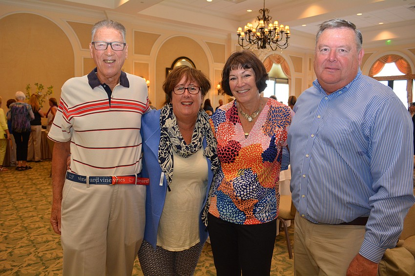Bob and Kelly Hamm, of River Strand, chat with Diane and Howard Germon, of the Lakewood Ranch Golf and Country Club.