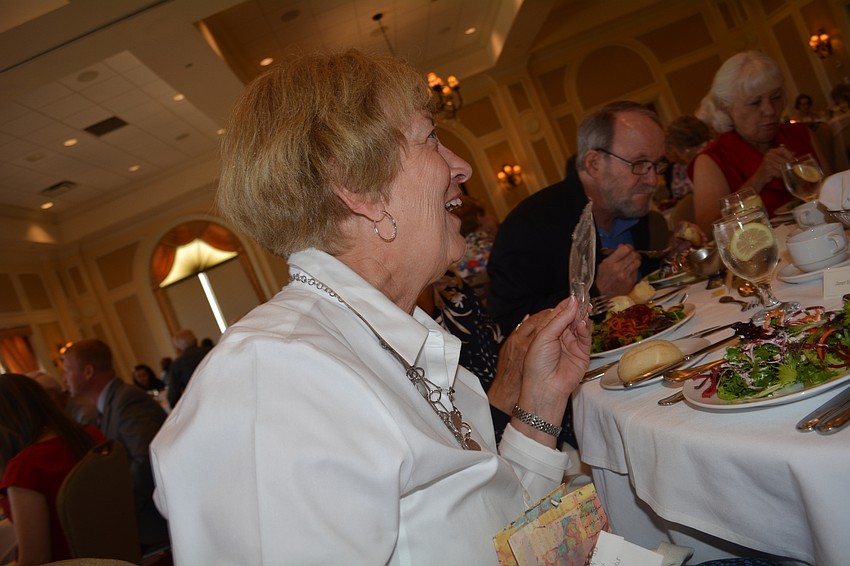 Janet Hough won an Alex and Ani brand lobster charm bracelet from the silent auction.