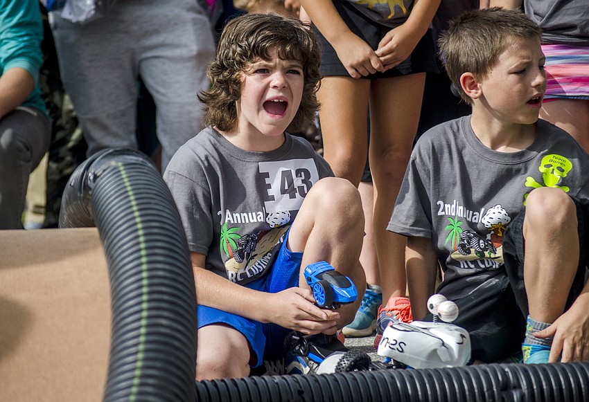 Riley Reffuge and Parker Wilding cheer as the RC Car Open begins