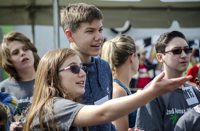Gabriella Gentile and Jacob Bobenmoyer check the results after finishing the blind course.