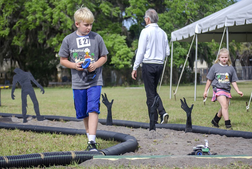 Maxwell Finger practices maneuvering through the obstacle course.