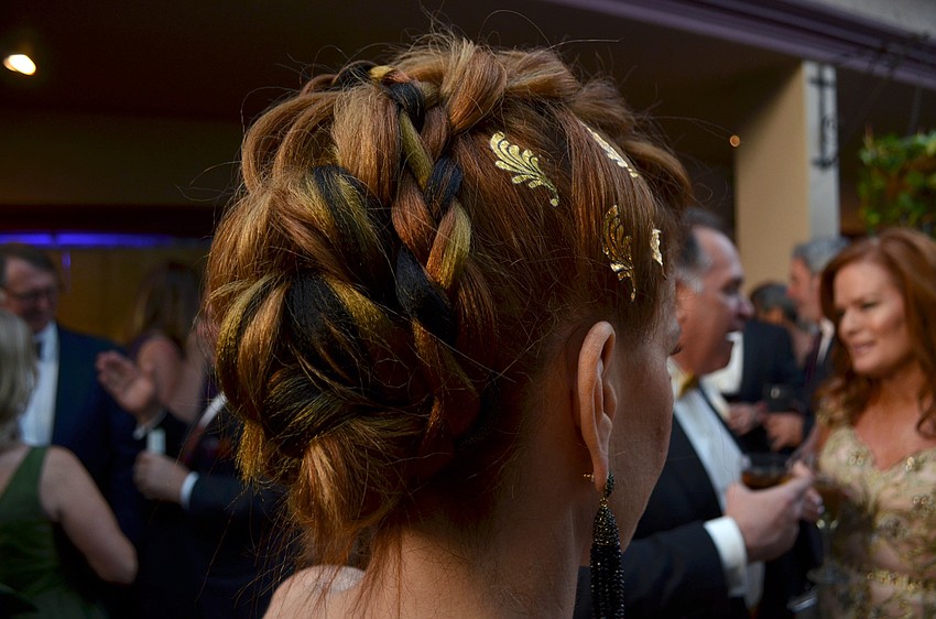 Renee Phinney sported an intricate updo featuring temporary tattoos and faux hair pieces at Fairytale Ball on March 25 at Michael’s On East.