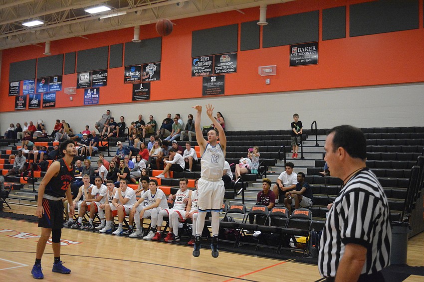 The Out-of-Door Academy'  s Nate Patrick takes a shot for Sarasota County in the boys game.