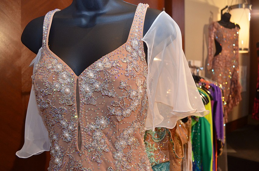 Several ballroom dresses by WE Design were on display at Sarasota Challenge on March 26 at Hyatt Regency Sarasota.