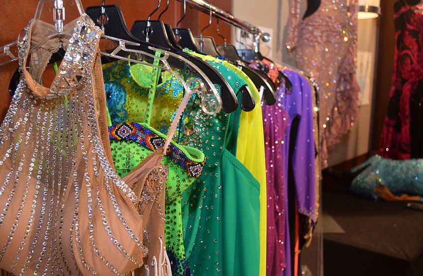 Several ballroom dresses by WE Design were on display at Sarasota Challenge on March 26 at Hyatt Regency Sarasota.