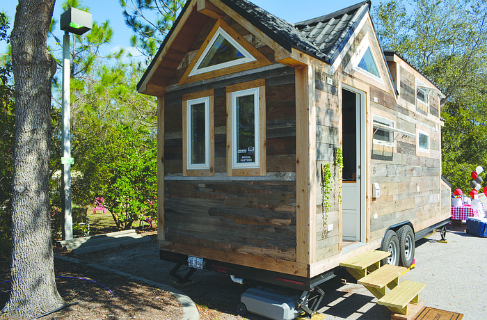 Tiny houses like this one are very popular. Stock art.