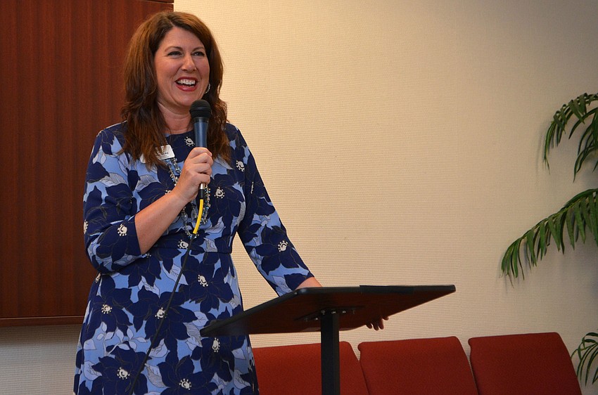 Denise Pope, executive vice president and chief philanthropy officer for Tidewell Hospice, speaks at her Salon Series lecture on March 30 at Designing Women Boutique.