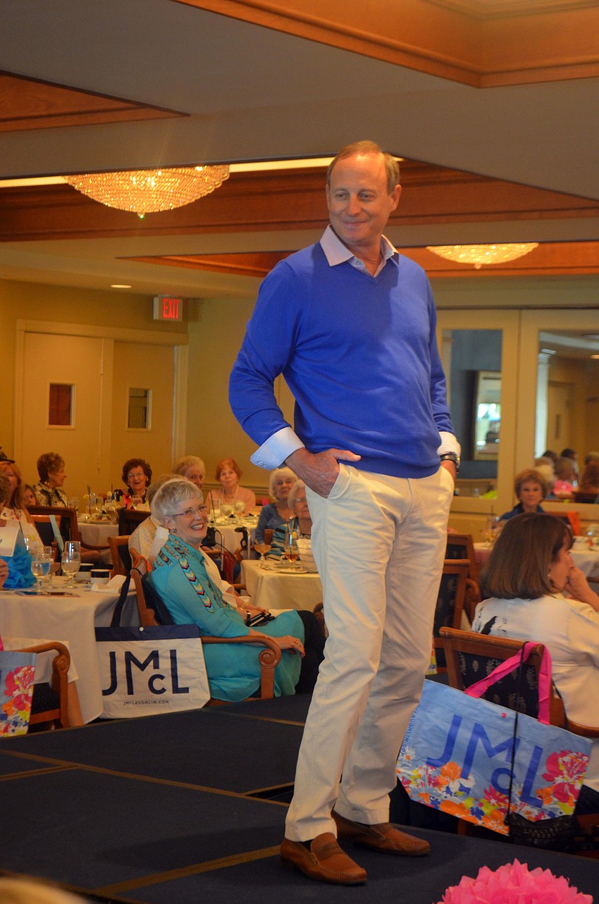 Gary Coffin strikes his best pose during the March style show at Bird Key Yacht Club.