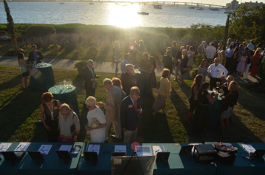 Seabird supports mingled on the lawn of Michael’s on the Bay at Selby Gardens during the  cocktail hour of Sunset Soiree.